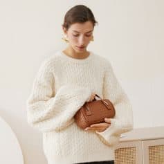 Elegant women with fashionable glasses and trendy accessories.