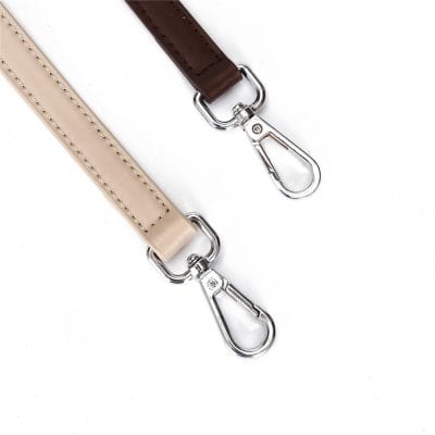 Durable leather eyeglass strap with metal clip, perfect for keeping glasses secure and accessible for daily wear.