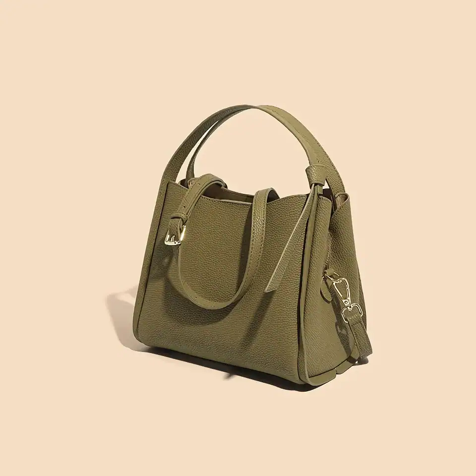 Elegant olive green women's handbag with multiple straps, spacious interior, and premium leather texture, perfect for fashion-forward women seeking luxury accessories.