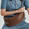Stylish brown leather crossbody bag perfect for women and men, ideal for everyday use, travel, and outings. Crafted with high-quality leather for durability and a sleek look.