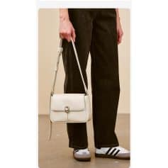 Elegant white shoulder bag with sleek design, perfect for daily use. Features a secure turn-lock closure and adjustable strap, blending style and practicality for any occasion.