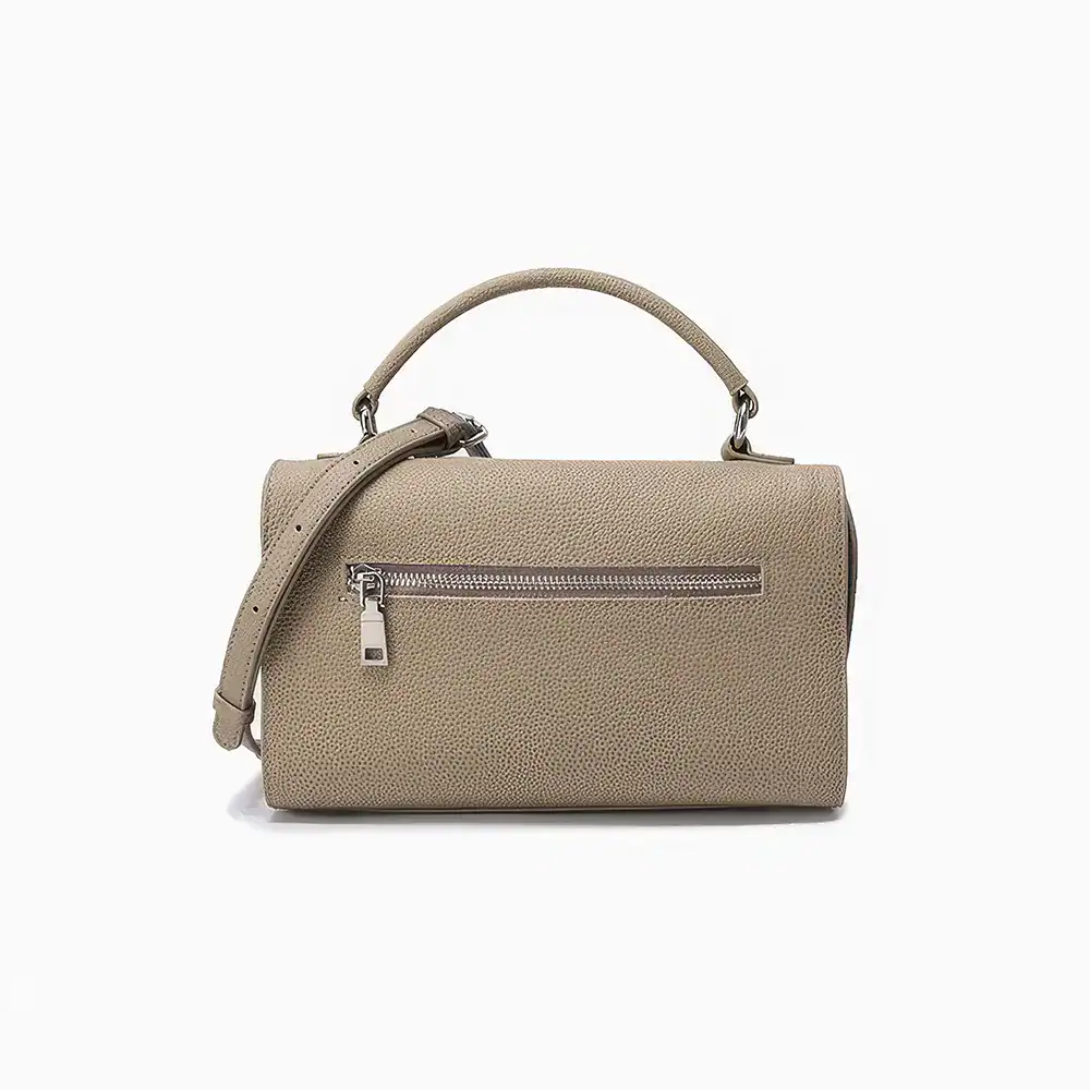 Versatile beige handbag with adjustable strap and front zipper pocket, perfect for stylish women. Ideal accessory for daily use, shopping, or office, combining fashion and functionality.