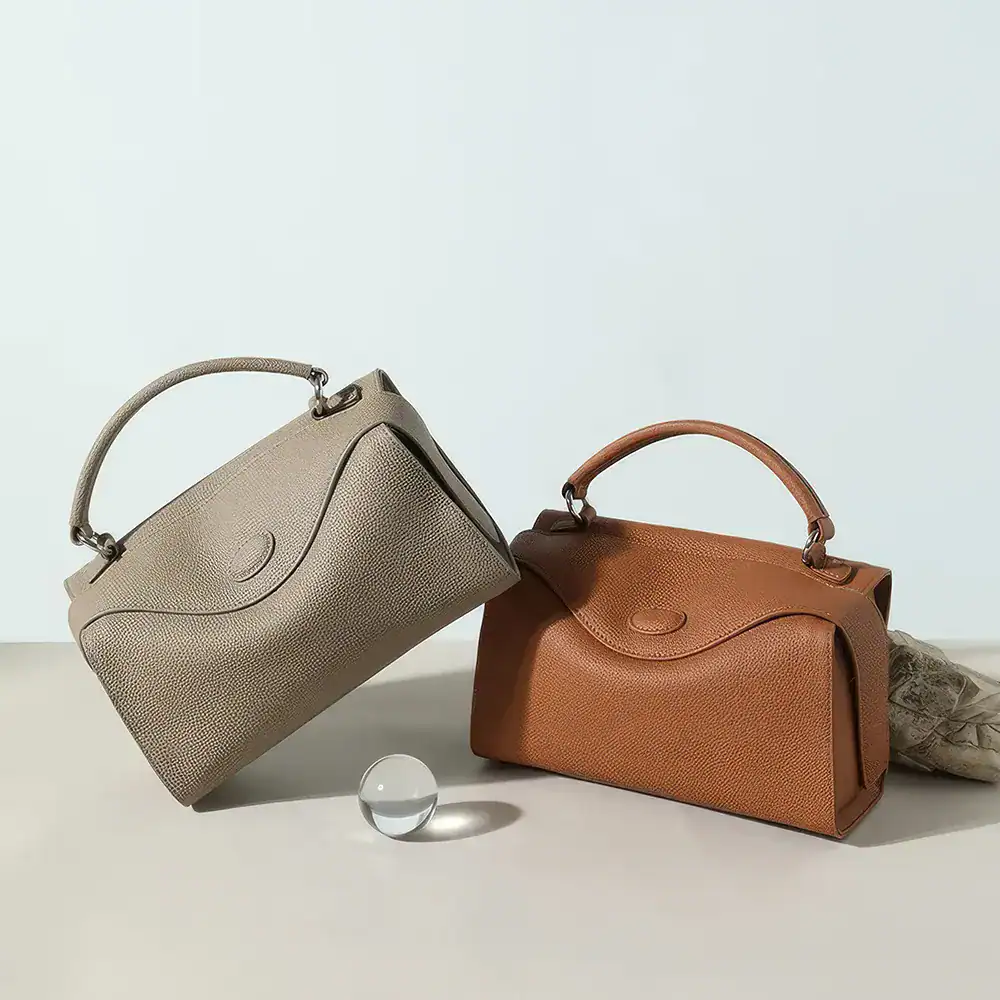 Stylish leather handbags with top handles, perfect for fashion-forward women and all occasions. Crafted from premium materials for durability and sophistication.