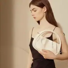 Stylish white handbag for women, perfect for daily use and special occasions. Shop premium quality, trendy handbags online at Monalisa Medical. Enhance your look today!.