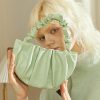 Stylish mint green handbag with ruched design, perfect for fashion-forward women. Ideal for everyday use, shopping, or special occasions, adding a pop of color to your outfit.