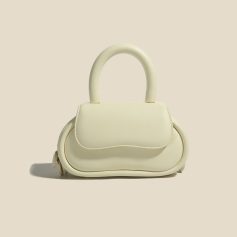 Luxurious white handbag crafted with high-quality material, perfect for fashion-forward women seeking stylish accessories for various occasions.
