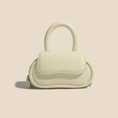 Luxurious white handbag crafted with high-quality material, perfect for fashion-forward women seeking stylish accessories for various occasions.