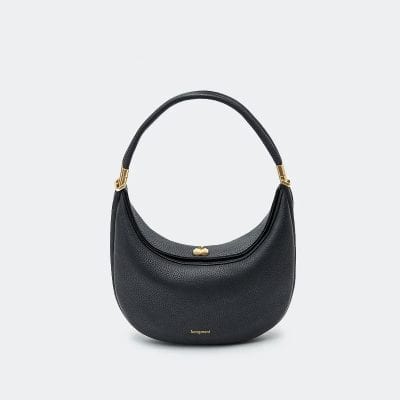 Elegant black leather designer handbag with gold accents, perfect for fashion-forward women. Made by Songmont, ideal for accessories and daily style.