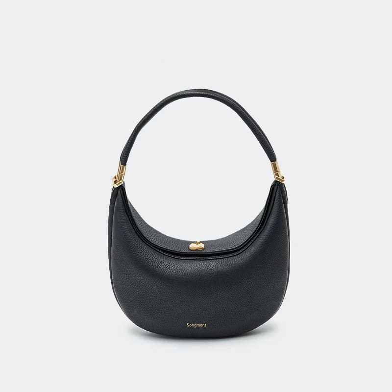 Elegant black leather designer handbag with gold accents, perfect for fashion-forward women. Made by Songmont, ideal for accessories and daily style.