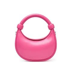 Stylish pink handbag with unique circular handle, perfect for fashion-forward accessories. Ideal for women seeking trendy, elegant, and durable bags for daily use or special occasions.