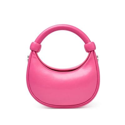 Stylish pink handbag with unique circular handle, perfect for fashion-forward accessories. Ideal for women seeking trendy, elegant, and durable bags for daily use or special occasions.