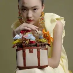 Elegant handbag with floral accessories for women, perfect for fashion-forward accessories shopping at Monalisa Store.