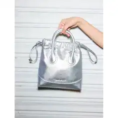 Stylish silver handbag with sturdy handles, ideal for fashion-forward women, perfect for daily use or special occasions, showcasing modern design and premium quality materials.