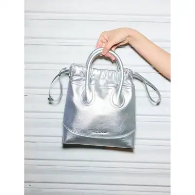 Stylish silver handbag with sturdy handles, ideal for fashion-forward women, perfect for daily use or special occasions, showcasing modern design and premium quality materials.