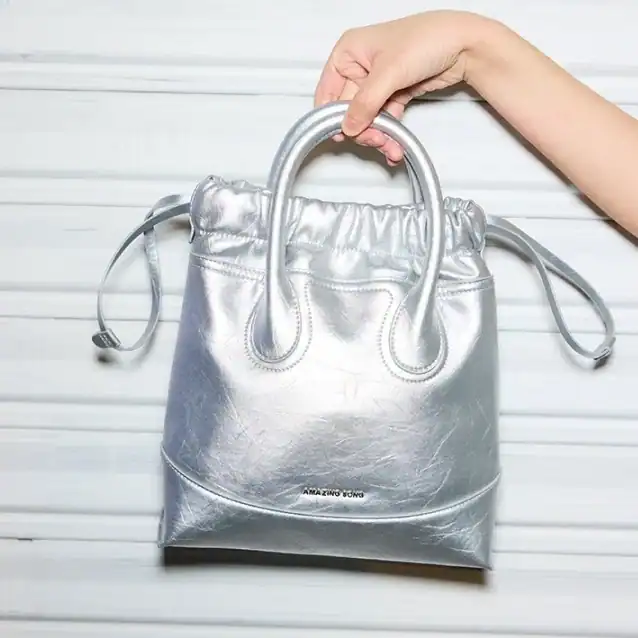 Shiny silver stylish handbag for women, trendy fashion accessory, perfect for everyday use or special occasions, enhances your lifestyle, high-quality design.