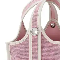 Elegant pink and white leather organizer for cosmetics, jewelry, or accessories with durable snap buttons and smart compartments. Perfect for stylish storage and organization.