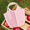Pink tote bag with quality fabric and stylish design, perfect for daily use and shopping. Light, durable, and fashionable, ideal for carrying essentials with ease and style.