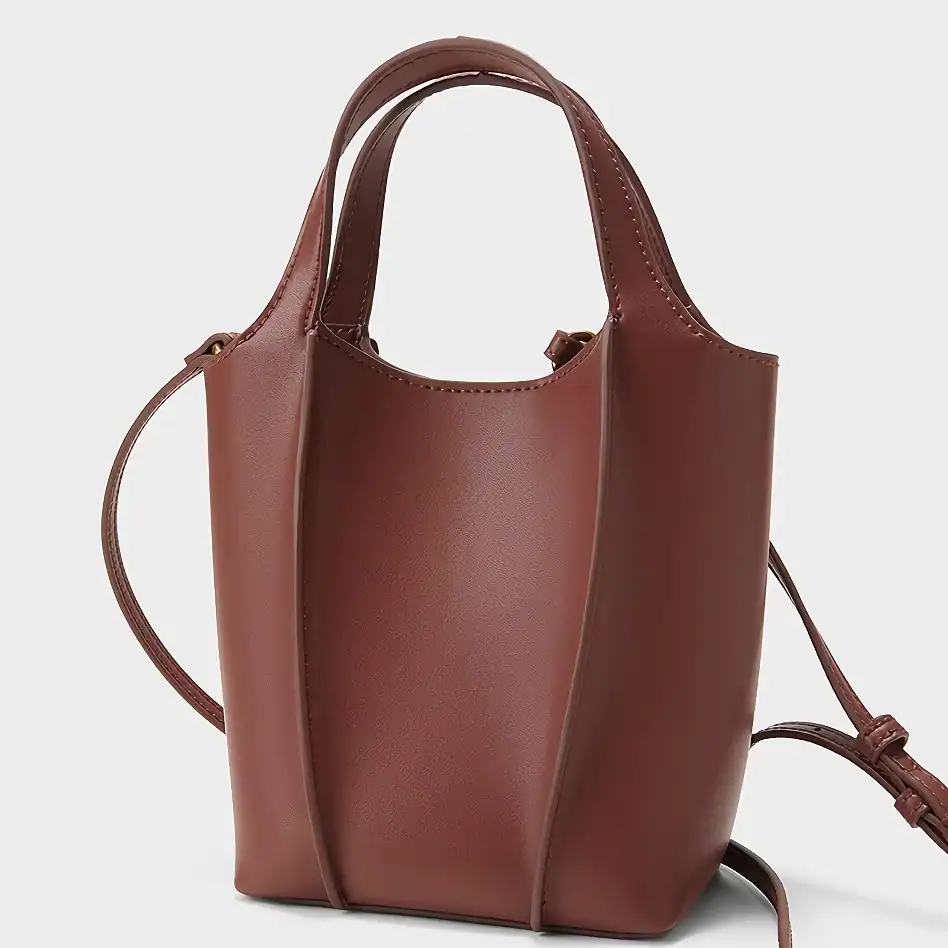 Luxury leather tote bag for stylish women, spacious and durable. Perfect accessory for shopping, work, or casual outings. Elegant design enhances any outfit, combining functionality and fashion.