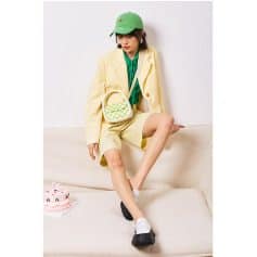 Stylish woman wearing trendy outfit with accessories from Monalisa Store, perfect for contemporary fashion and optical accessories.