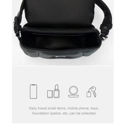Compact black travel bag for storing daily essentials including mobile phone, keys, lipstick, and more.