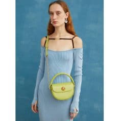 Stylish lime green crossbody purse featuring a sleek gold clasp, perfect for fashion-forward accessories. Ideal for casual or elegant outfits, offering a modern twist on essential jewelry and handbag trends.