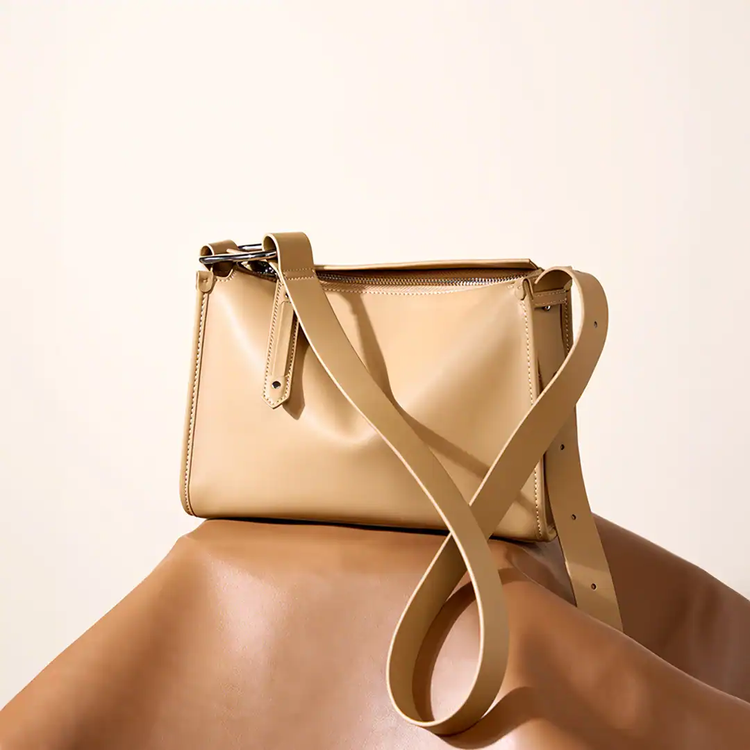 Minimalist beige shoulder bag perfect for cosmetic and medical use, featuring a sleek design and durable material.