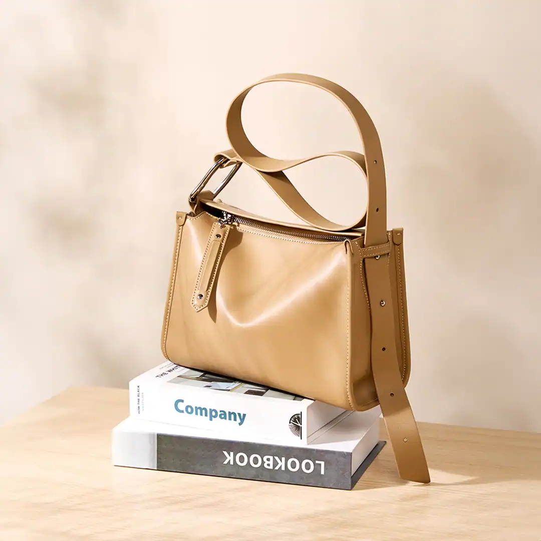 Chic beige women's handbag with adjustable strap, zipper closure, and minimalist design. Perfect accessory for daily use and fashionable look.