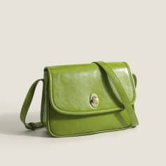 Stylish green vegan leather crossbody bag for women and men with a sleek design, ideal for eyes care accessories, optical items, and daily fashion needs.