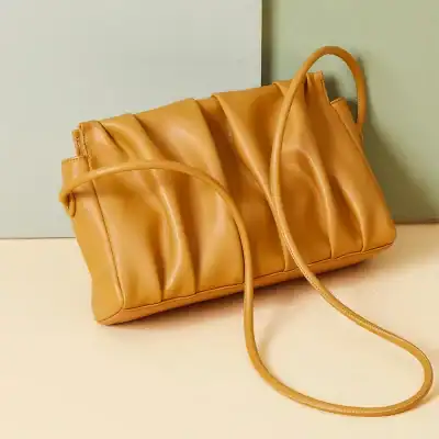 Elegant caramel leather tote bag, stylish and perfect for everyday use. Spacious design with comfortable handles, ideal for fashion-forward individuals seeking luxury accessories.