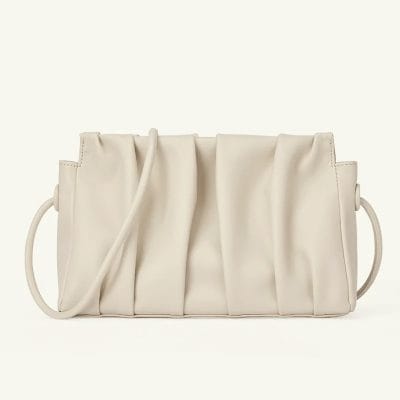 Stylish white handbag with pleated design, perfect for fashion-forward women seeking a versatile accessory for any occasion. Made from high-quality materials for durability and comfort.