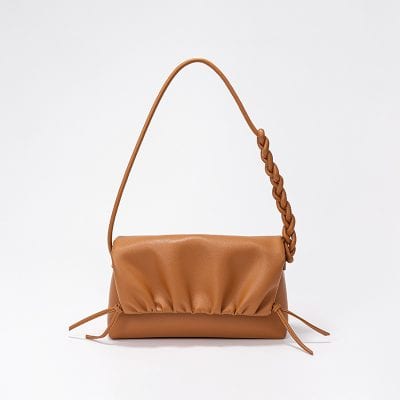 Stylish tan women's purse with braided handle and adjustable drawstrings, perfect for fashion-forward accessories and everyday use. Durable faux leather design.
