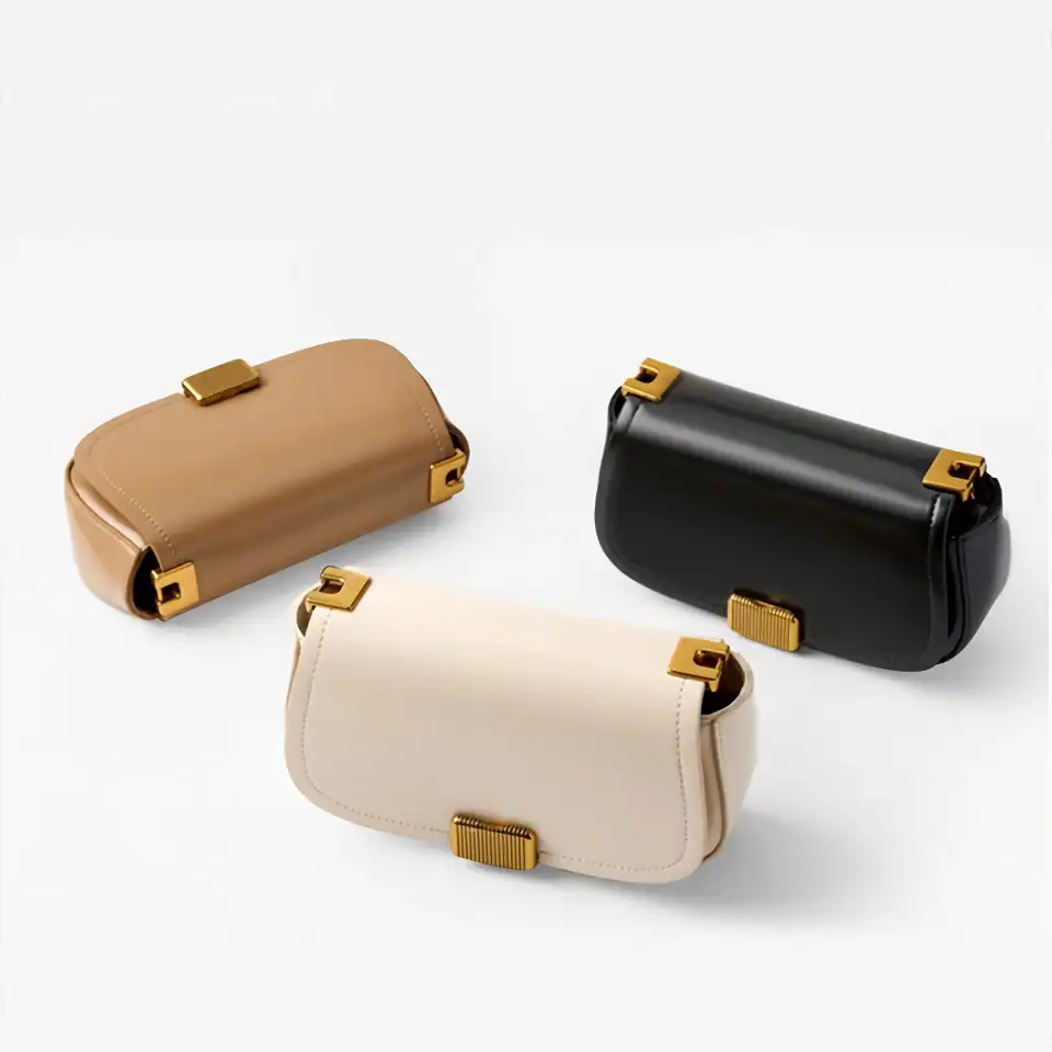 Elegant black, beige, and cream glasses cases with gold accents for stylish eye care storage.