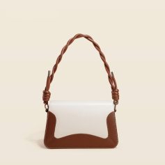 Stylish leather handbag with braided shoulder strap, perfect for fashion-forward women seeking luxury accessories. Ideal for everyday use or special occasions.