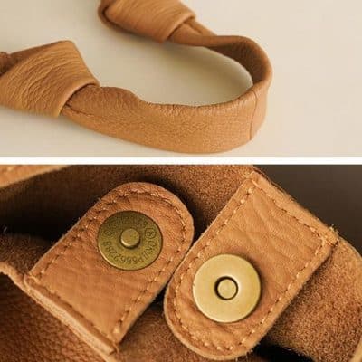 Elegant leather headphone strap with sturdy snap buttons, designed for a secure fit and comfort. Made from premium leather, ideal for daily use and fashion-forward look.