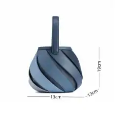 Stylish black medical bag with spiral design, perfect for healthcare professionals. Compact size 13cm x 13cm x 19cm, ideal for organizing medical tools and accessories efficiently.