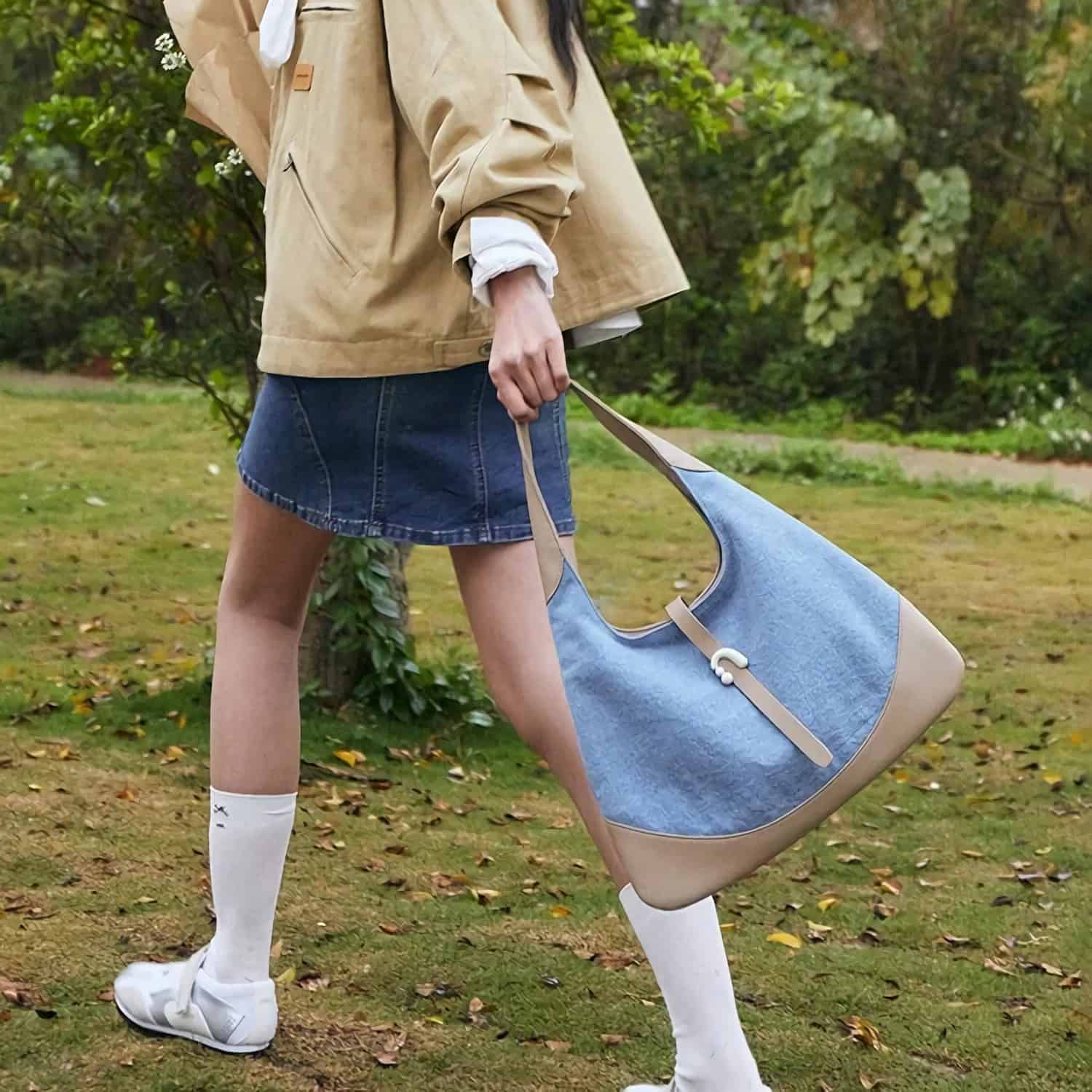 Large blue and beige designer tote bag for women, perfect for casual outings and shopping. Durable, fashionable, and spacious to carry essentials.