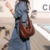 Striking brown leather handbag for women, perfect for daily use and fashion-forward outfits. Durable, stylish, and spacious, ideal for shopping, work, or casual outings.