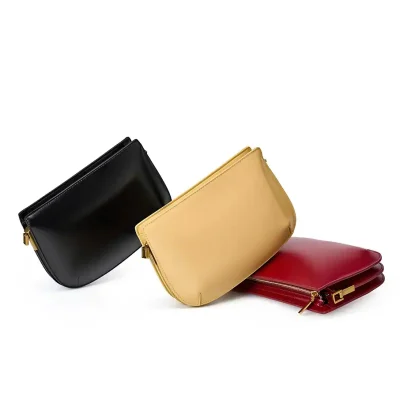 Elegant black, beige, and red leather clutch bags with gold zippers, perfect for stylish occasions. High-quality, fashionable accessories at Monalisa Store for women.