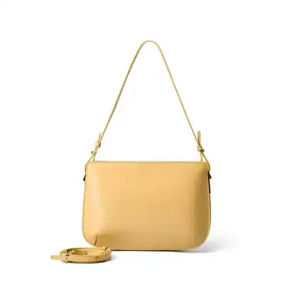 Stylish yellow leather shoulder bag with adjustable strap, perfect for women’s fashion accessories, travel, or casual outings. High-quality, lightweight design for everyday use.