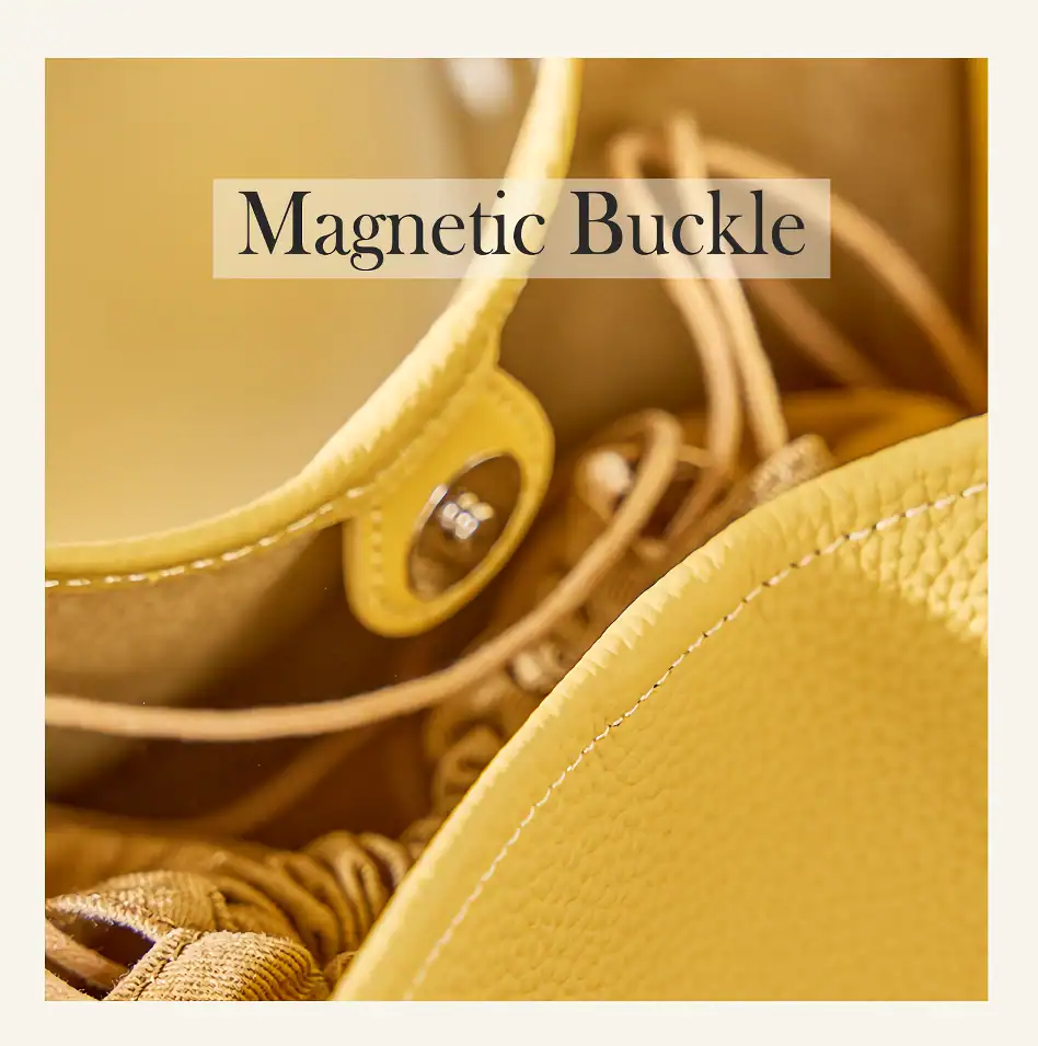 Close-up of a yellow bag with a magnetic buckle, highlighting durable material and stylish design, perfect for fashion-conscious shoppers seeking premium quality accessories.