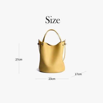 Stylish yellow handbag with adjustable strap, perfect for daily use and fashion statements.