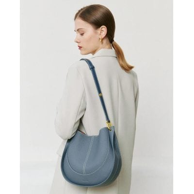 Stylish women's leather shoulder bag with adjustable strap, perfect for daily use, crafted from high-quality materials for durability and elegance.