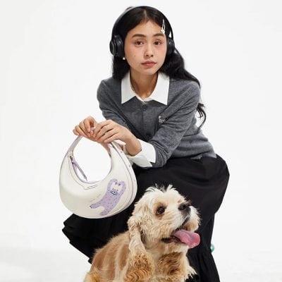 Young woman with stylish eyeglasses, fashionable clothing, and modern accessories, showcasing trendy eyewear options and optical products for a fashionable look.