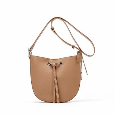Fashionable tan handbag with adjustable strap and stylish tie-closure, perfect for daily use and shopping, ideal accessory for women.