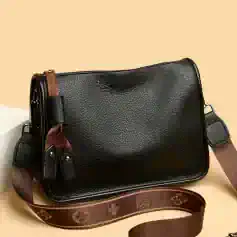 Stylish black leather bag for women with adjustable strap, perfect for everyday use and fashion-forward Looks.