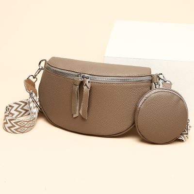 Elegant beige handbag with detachable round coin purse and printed strap for stylish optical and sunglass storage.