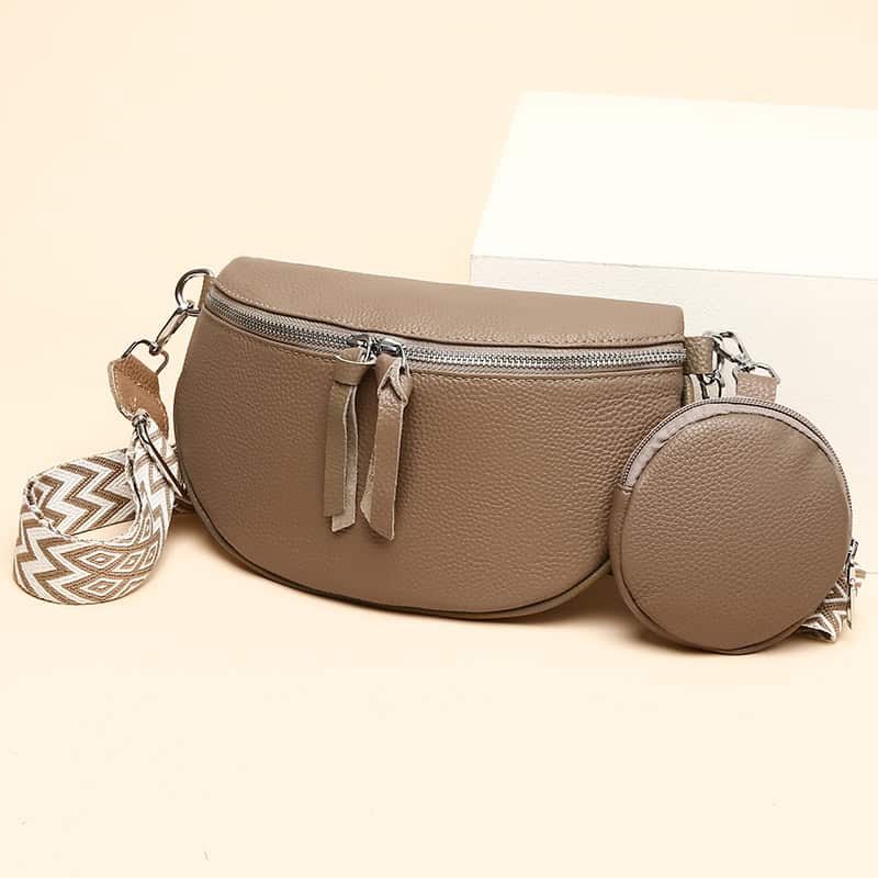 Elegant beige handbag with detachable round coin purse and printed strap for stylish optical and sunglass storage.
