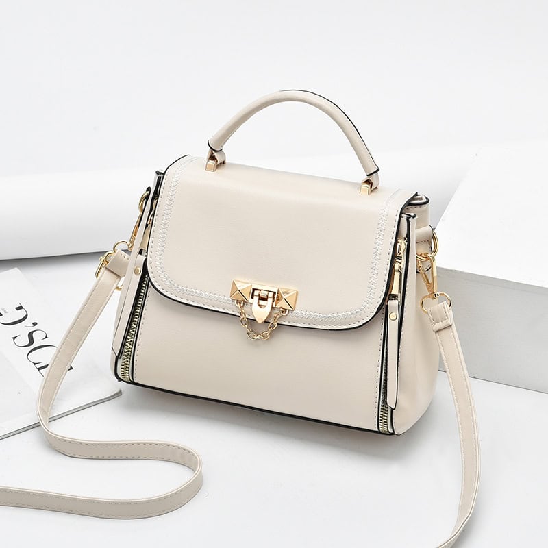 Stylish white handbag with gold accents, perfect for women’s fashion, daily use, and accessories. Ideal for casual or formal occasions, offering spacious interior and durable design.