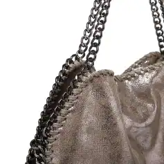 Elegant chain strap detail with textured metallic finish, perfect for luxury fashion accessories.