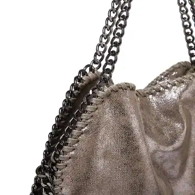 Elegant chain strap detail with textured metallic finish, perfect for luxury fashion accessories.